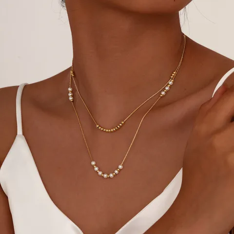 COLLAR DOBLE CON PERLAS