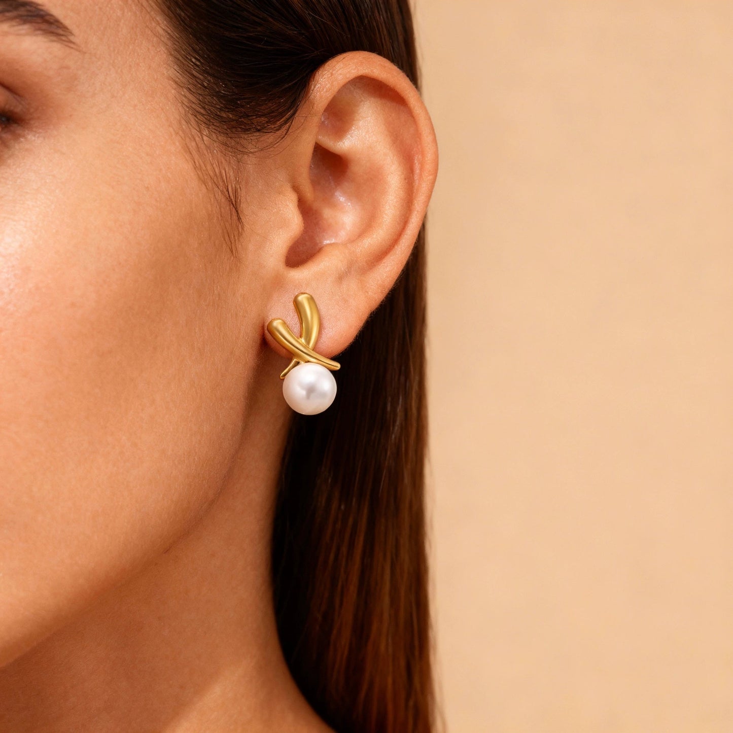 ARETE CRUZADO CON PERLA