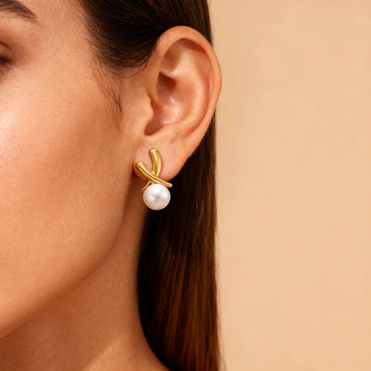ARETE CRUZADO CON PERLA